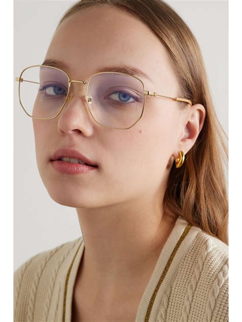 gucci hexagon-frame gold-tone|GUCCI EYEWEAR Hexagon.